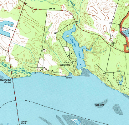 in 1994, a dam maintained Charles Lake and blocked the natural flow of brackish water