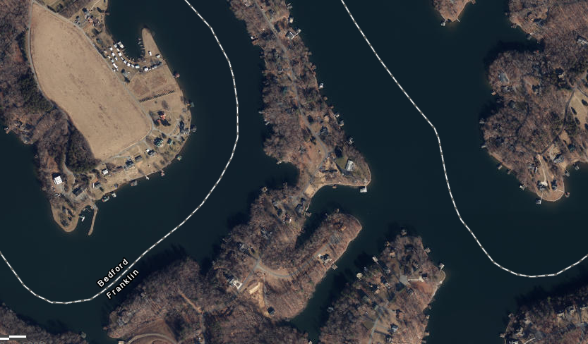 the Virginia Marine Resources Commission plays no ole in managing development along the shoreline of Smith Mountain Lake, because the state of Virginia does not claim jurisdiction over lands submerged beneath artificial lakes