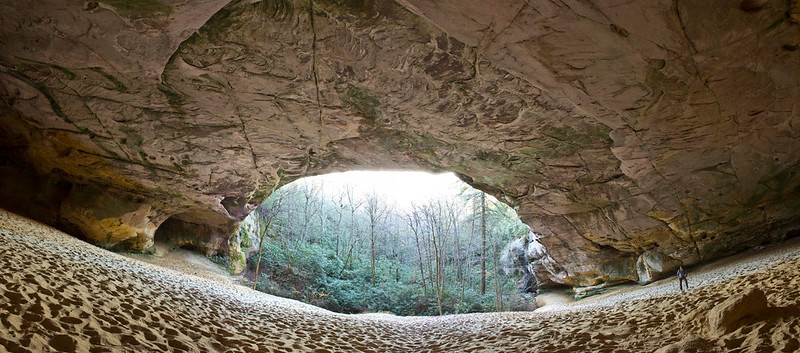 Sand Cave, eroded into sandstone, is accessed by a trail from Ewing but is located in Kentucky