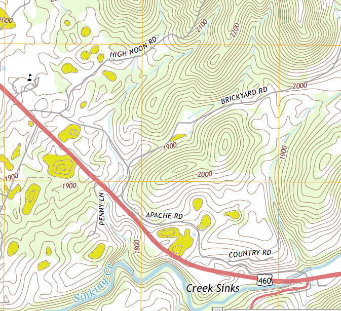 sinkholes (shaded yellow) are clear signs of karst topography - as are creeks that lose water underground and sink out of sight