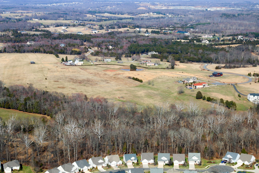 wherever a growth boundary is defined by planning/zoning, landowners on the other side of the line will have less development potential