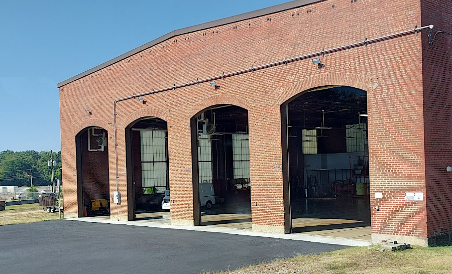 the historic railroad roundhouse has been retained on the base