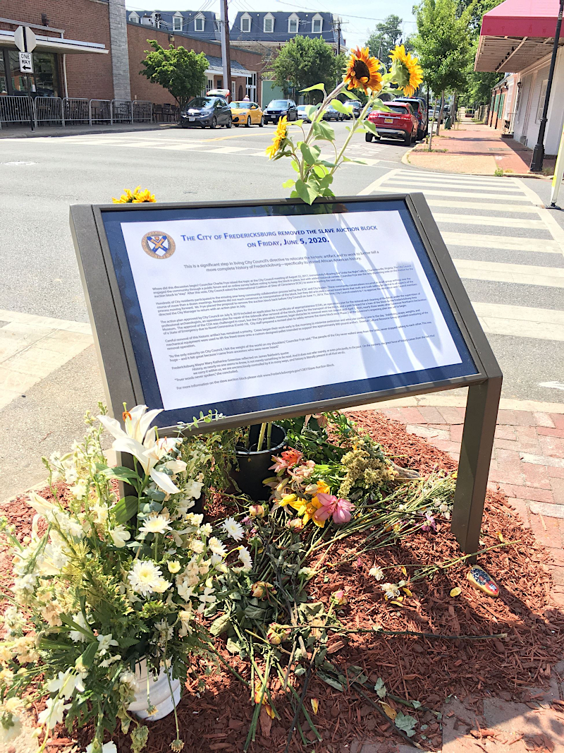 an interpretive panel was installed at the site of the slave auction block