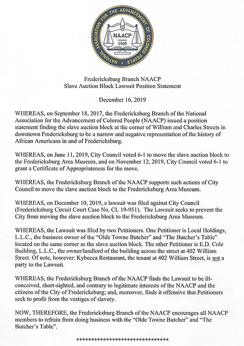 the NAACP called for a boycott of businesses associated with the filer of a lawsuit trying to stop removal of the slave auction block