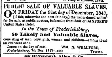 enslaved people were sold in front of the hotel once located next to the stone