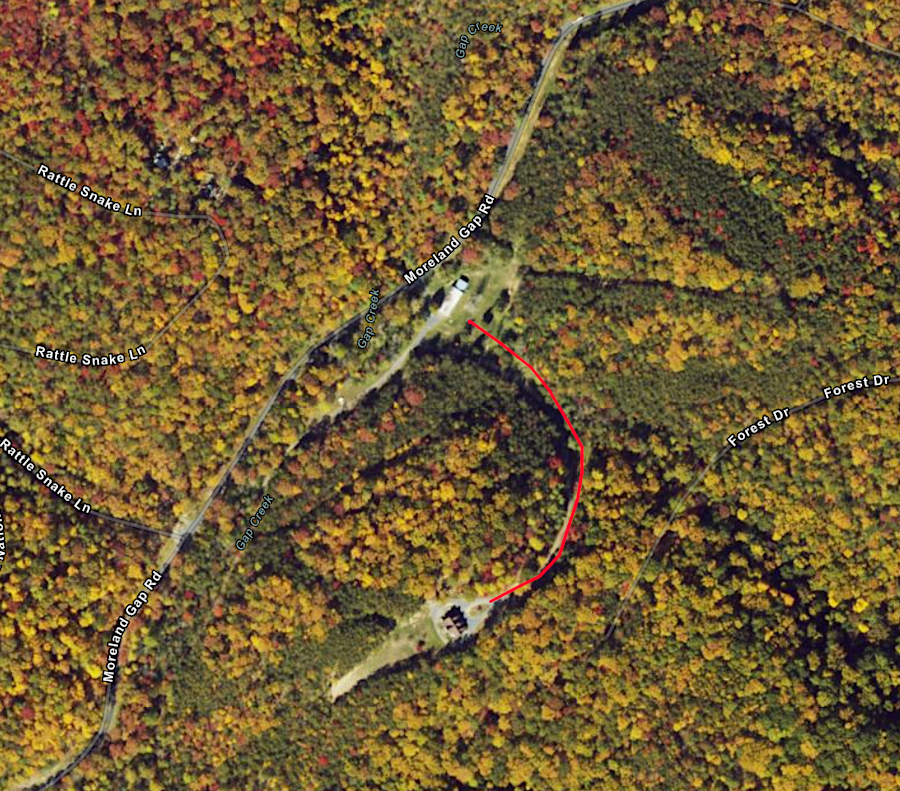 pine trees now reveal the outline of former ski slopes around the 900-foot long double lift chair (red line) at Mountain Run