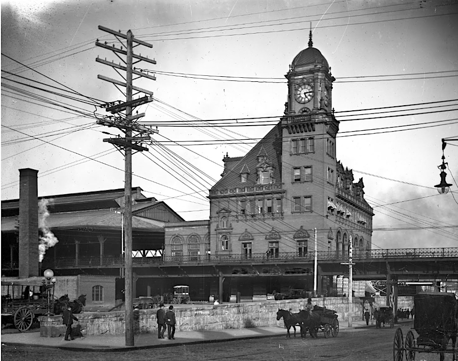 travelers getting off the train in the early 1900's relied upon horses to get to their final destination