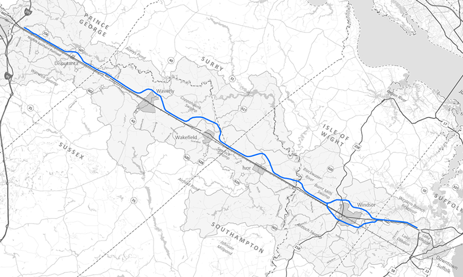 state transportation officials shifted policy in 2014 and supported building bypasses of towns on existing US 460 rather than a complete toll road, after governors changed and Federal officials signaled objections to wetlands destruction