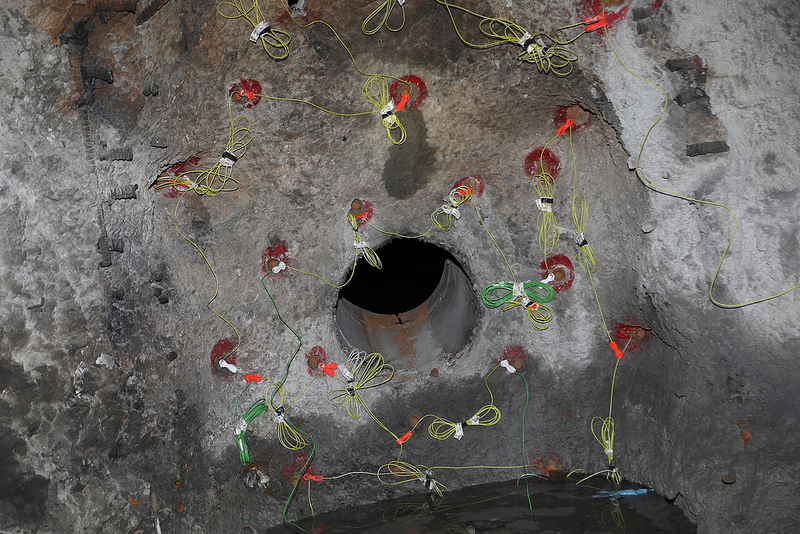 modern explosives were used to blast away the thick natural gas bulkheads so tourists could walk through the whole tunnel