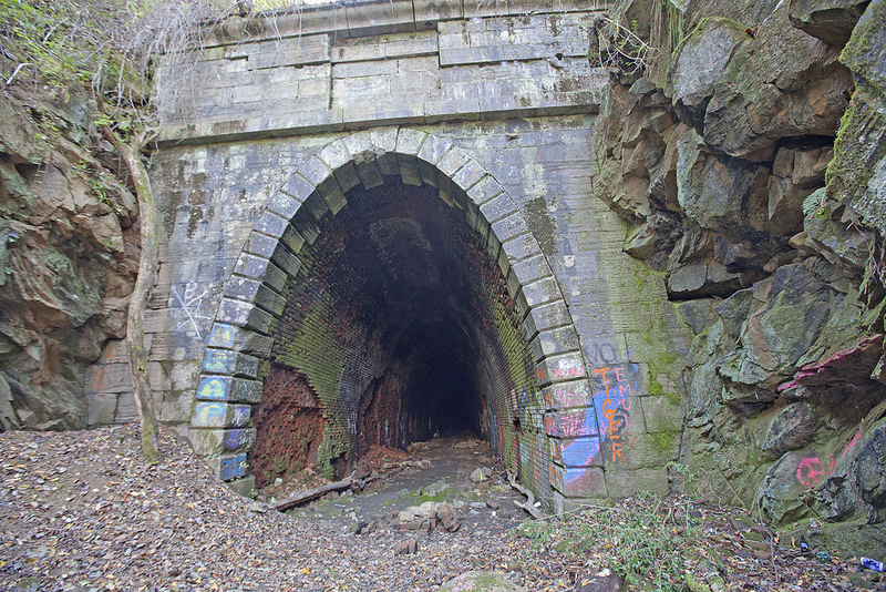 the western portal was reinforced with a brick lining, since it was carved through metamorphosed sediments rather than greenstone