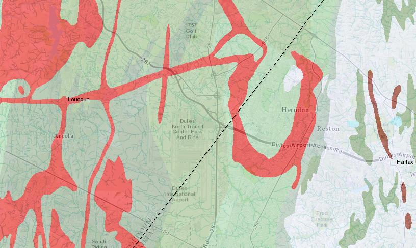 Dulles is located in a Triassic basin, providing a flat valley - though igneous dikes (colored red) increased construction costs of underground tunnels