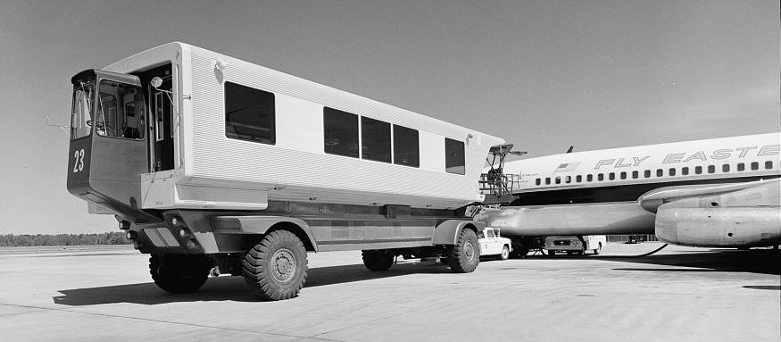 at Dulles, passengers transferred from the terminal to airplanes via people movers until the terminal was expanded in 2000