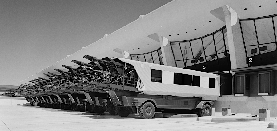 at Dulles, passengers transferred from the terminal to airplanes via people movers until the terminal was expanded in 2000
