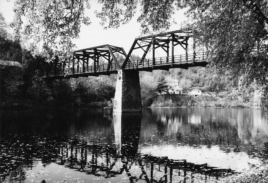the last major bridge with all-wooden support timbers, the Springwood Truss Bridge built in 1884 over the James River in Botetourt County, was removed after a 1985 flood