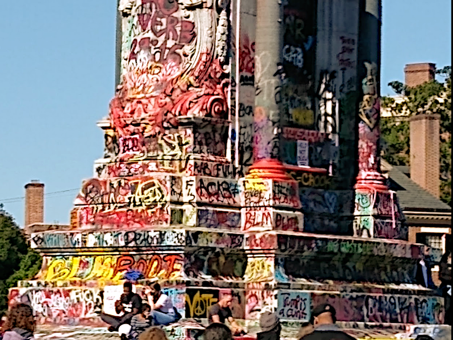 the pedestal of the Robert E. Lee monument was covered with graffiti during Black Lives Matter demonstrations after the death of George Floyd in 2020