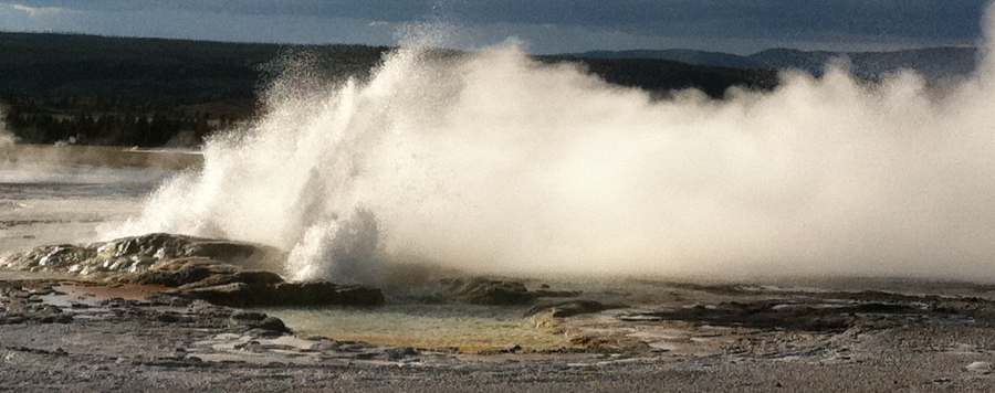 geysers in Yellowstone National Park are generated by water heated at depth, reaching the boiling point, and then surging to the surface